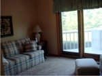Den with Access to Back Porch